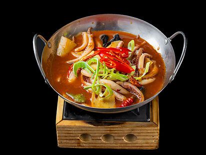 CALAMARI PICCANTI IN PADELLA DI FUOCO